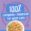 Cat food on a white plate with a purple background and text about complete and balanced diet for adult cats.