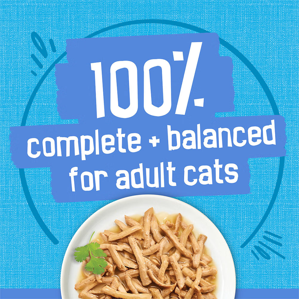 Cat food on a white plate with text '100% complete + balanced for adult cats' on a blue background