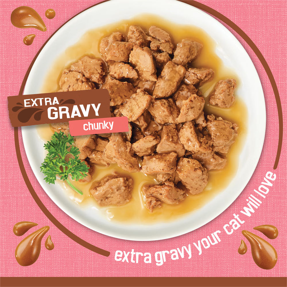 Cat food with extra gravy on a pink background