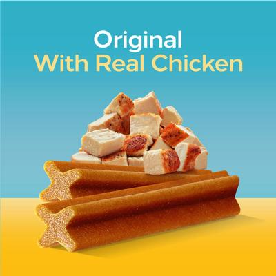 Dog treats with 'Original With Real Chicken' text on a blue and yellow background