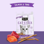 Kit Cat Cat Stick salmon and tuna treat packaging on a purple background