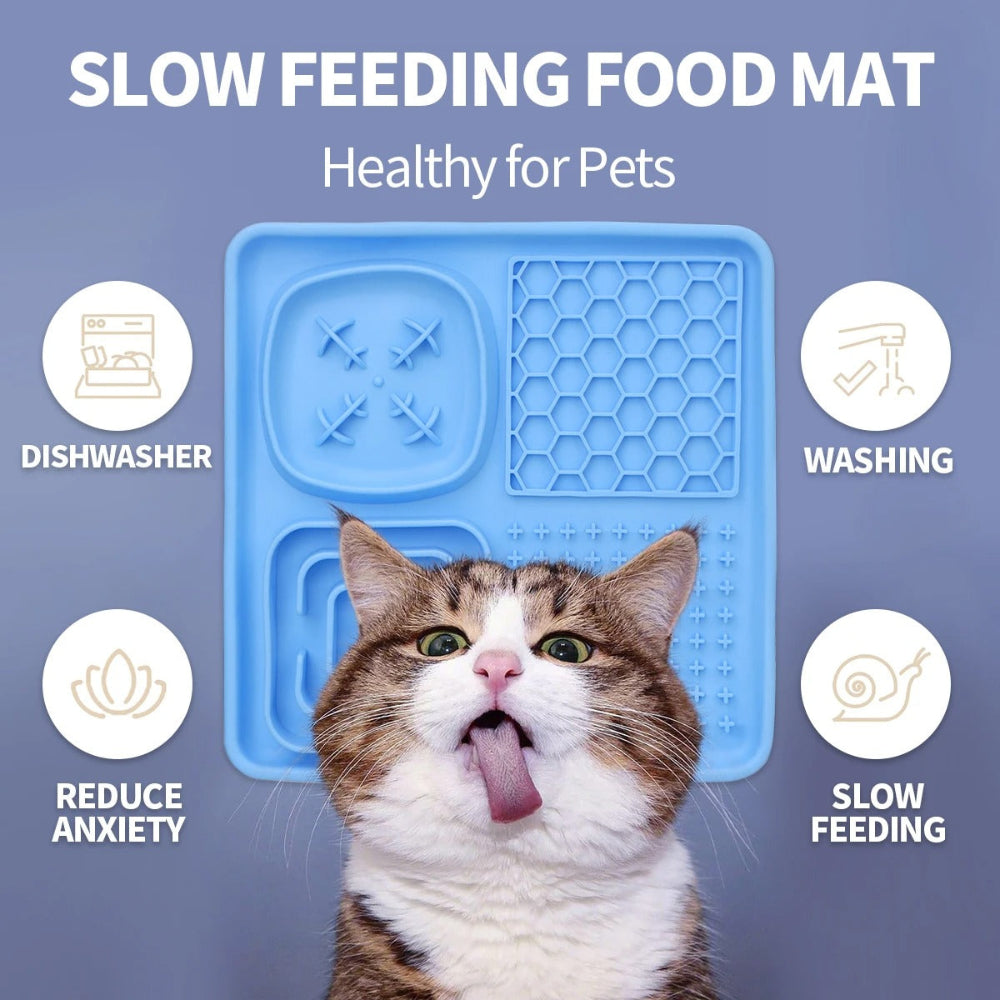 Cat with a blue slow feeding food mat on a purple background