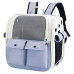 Pet carrier backpack with mesh window and handle on a white background
