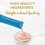 Blue packaging of a baby food product with text about high-quality ingredients on a white background.