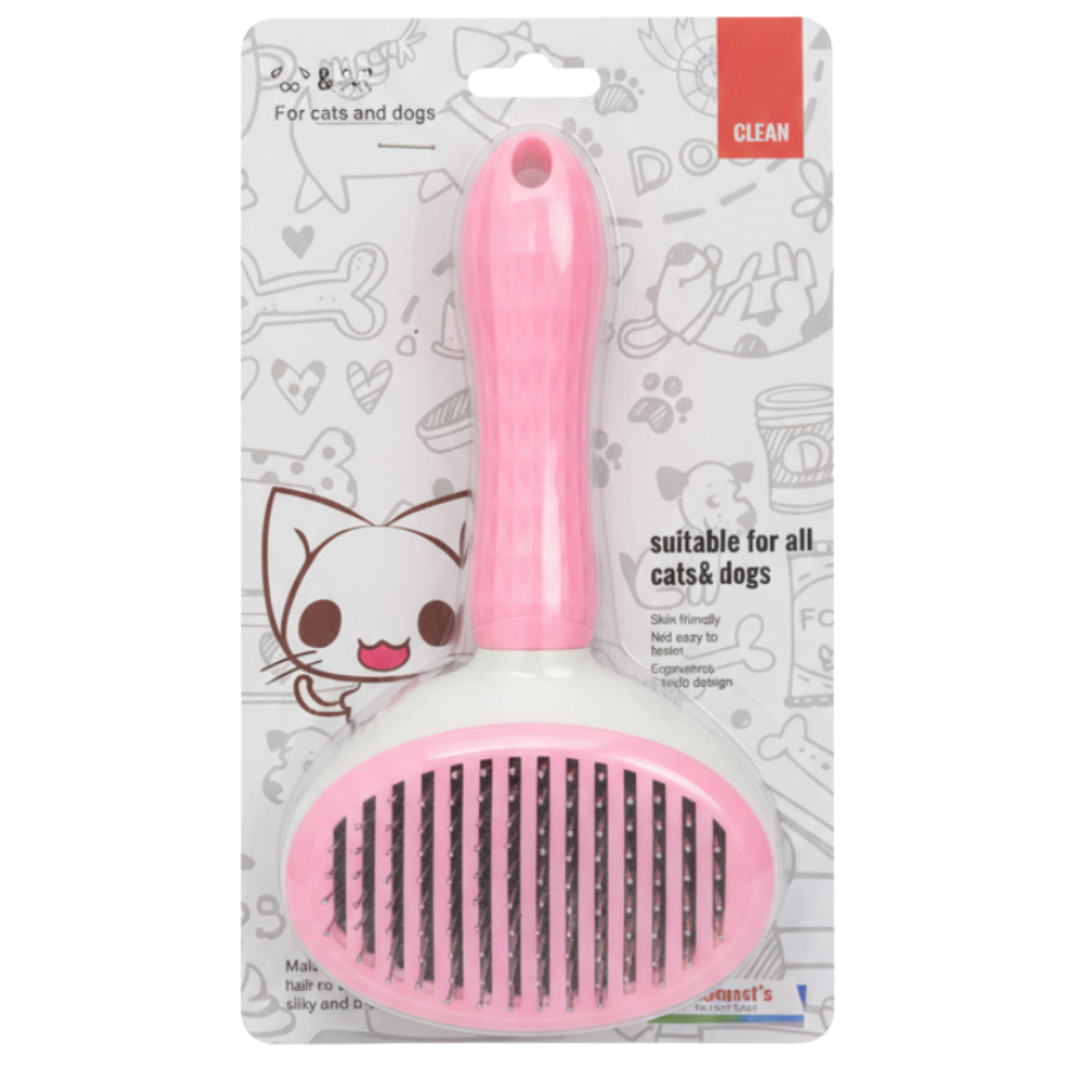 Pet grooming brush pink white background