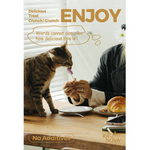 Cat eating from a person's hand with text about a delicious treat, set on a wooden table.