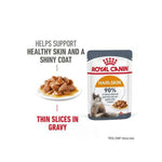 Royal Canin cat food package with text highlighting benefits on a white background