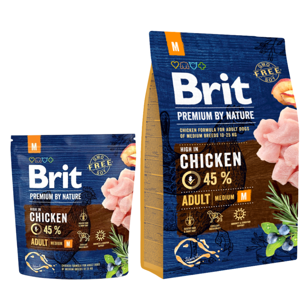 Two packages of Brit Premium by Nature dog food with chicken on a white background