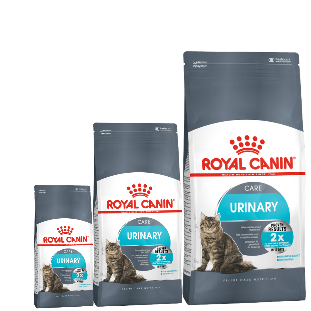 Three packages of Royal Canin Urinary Care cat food on a white background