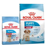 Two packages of Royal Canin Puppy Medium dog food on a white background