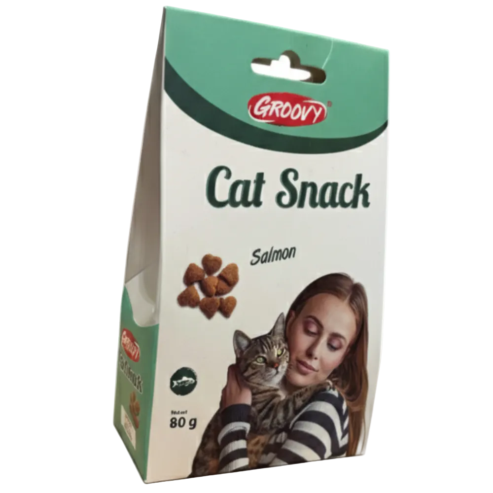 Groovy Cat Snack Salmon package with a woman holding a cat on a white background