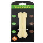 Glow-in-the-dark dog bone toy on black packaging with text and brand logo.