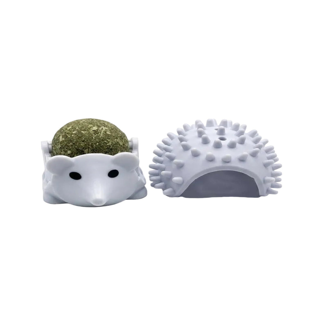 Hedgehog-shaped pet toy with a ball of kibble on a white background