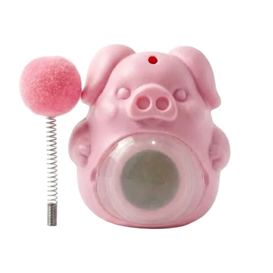 Pink pig-shaped toy with a spring on a white background