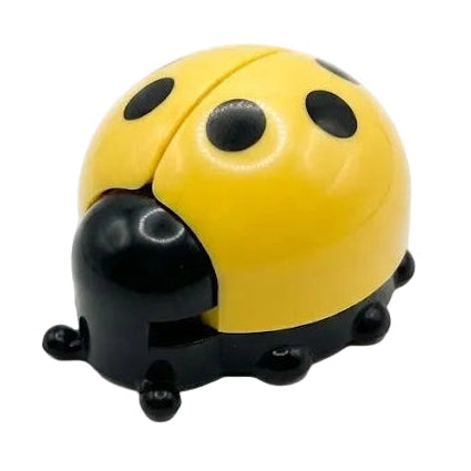 Yellow and black ladybug-shaped object on a white background