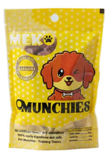 Yellow package of Munchies dog treats on a white background