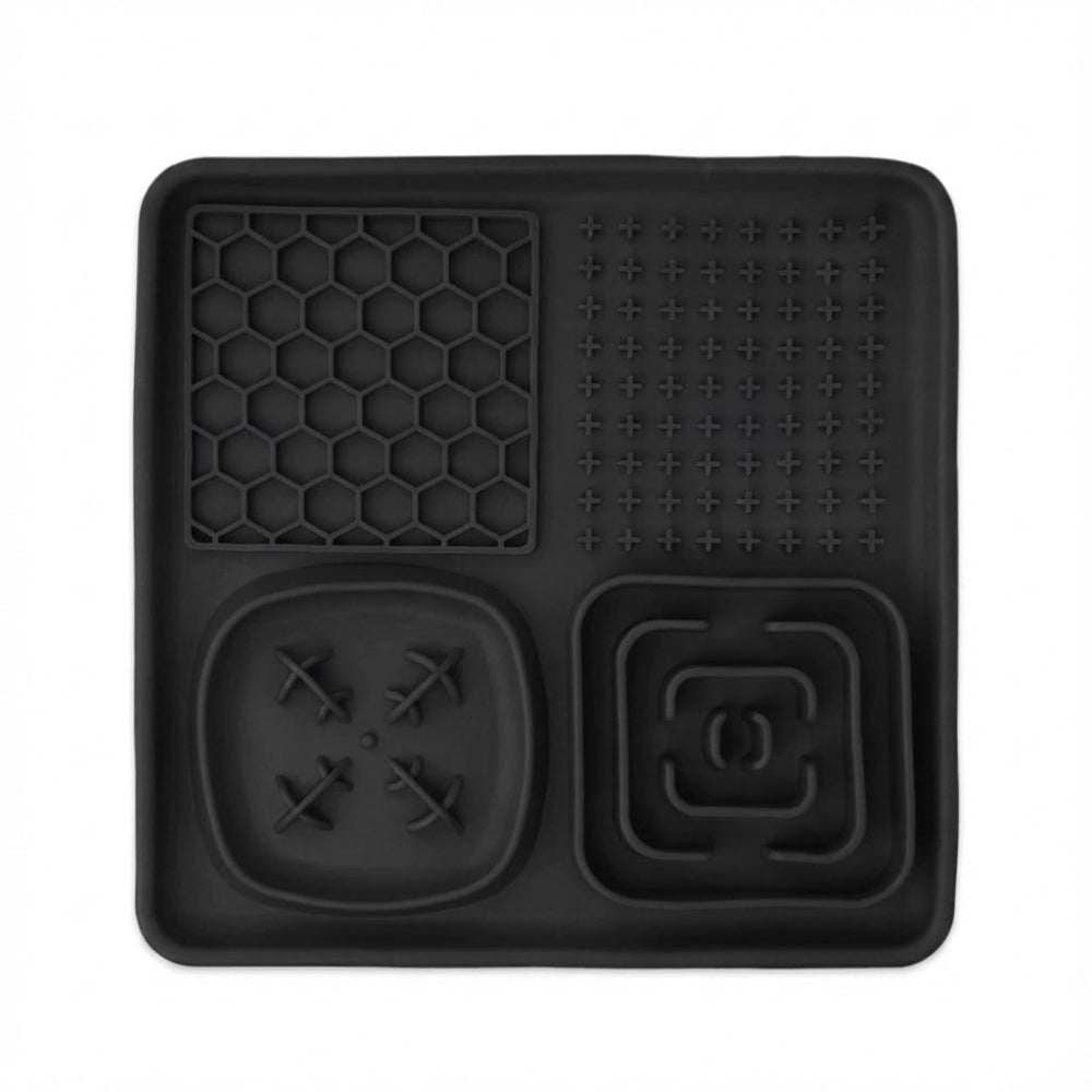 Black silicone mat with various textured patterns on a white background