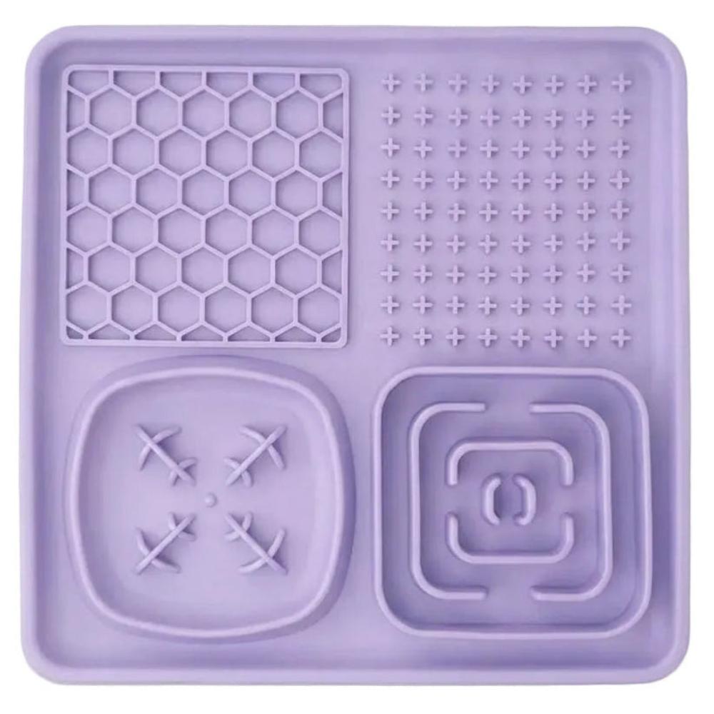 Purple silicone mat with various patterns on a white background