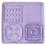 Purple silicone mat with various patterns on a white background