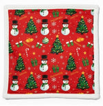 Two Christmas-themed pot holders with red and green patterns on a white background.