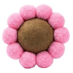 Pink flower-shaped pet toy with a brown center on a white background
