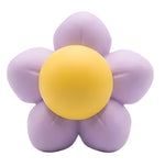 Flower-shaped object with a yellow center and purple petals on a white background