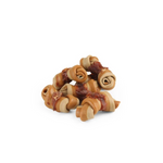 Dog chew toy with wooden rings and meaty texture on a white background