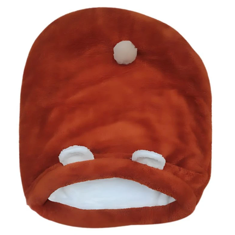 Red plush toy with white accents on a white background