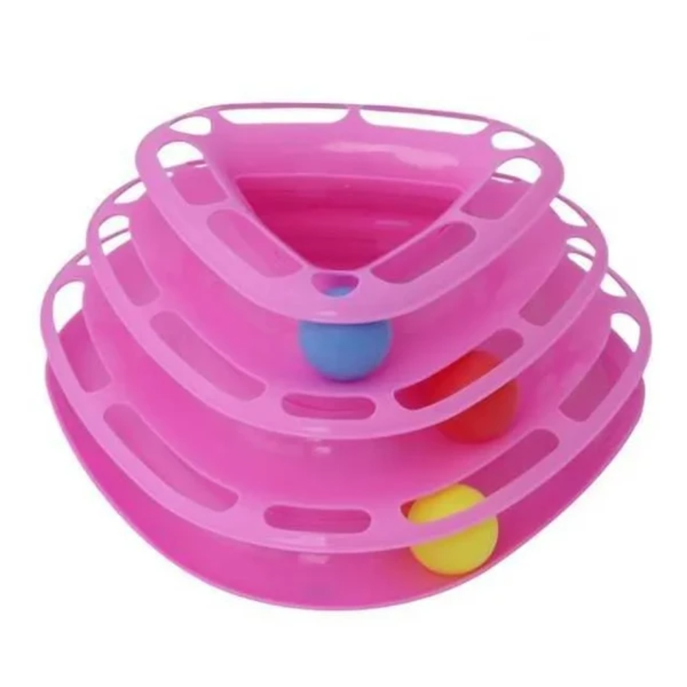 Pink plastic toy with colorful balls on a white background