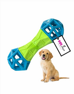 Dog toy with blue and green design and a puppy sitting next to it on a white background