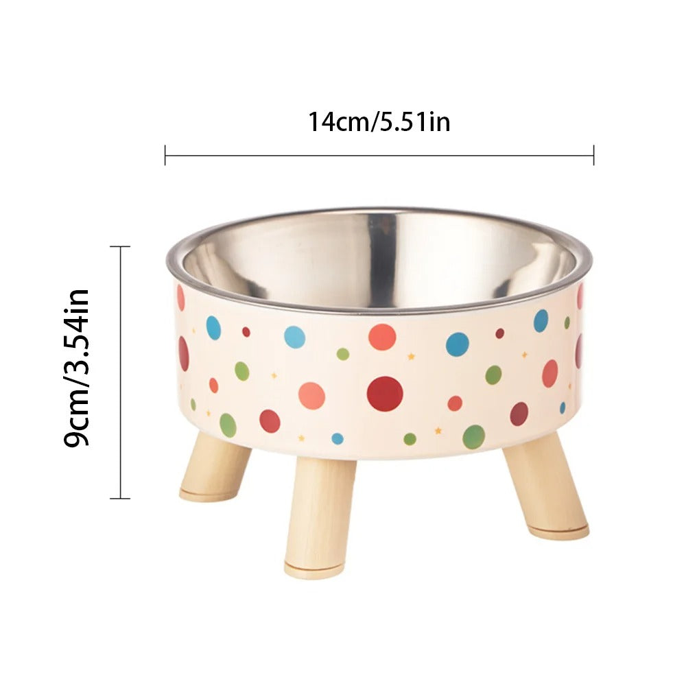 Pet bowl with colorful polka dot design and wooden legs, shown with dimensions on a white background.