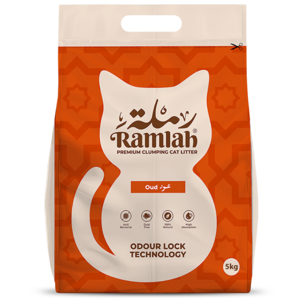 Bag of Ramlah cat litter with a white cat illustration on an orange background