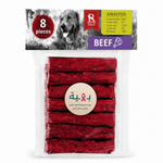 Pack of 8 beef jerky strips in a clear plastic bag with a printed header card. The header card shows a black-and-white photo of a dog, an analysis panel, and a purple 'BEEF' label.