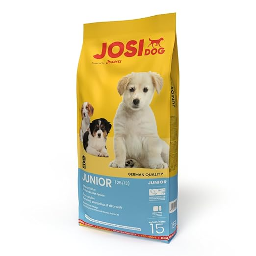 Bag of JosiDog Junior dog food with images of puppies on a white background
