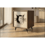 Wooden pet bed with a cat design on a wooden floor