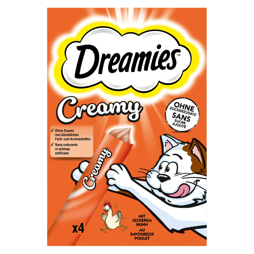 Dreamies Creamy cat treat packaging with cartoon cat and text on an orange background