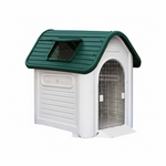 Dog house with green roof and white body on a white background