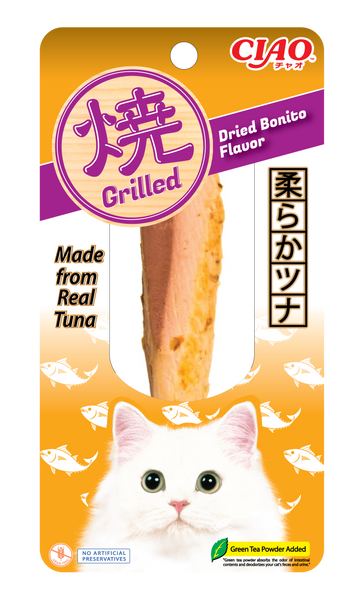 Cat treat package with grilled dried bonito flavor, featuring a white cat on an orange background.