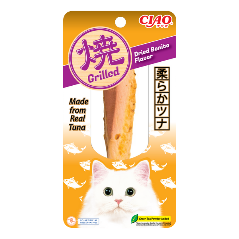 Cat treat package with grilled dried bonito flavor, featuring a white cat on an orange background.