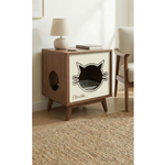 Wooden pet bed with cat face design on a side table in a room.