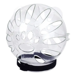 Clear plastic ball with black base on a white background