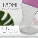 Bottle with measurement markings and a pink cap on a white background