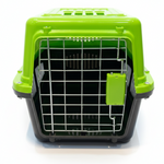 Green and black pet carrier on a white background