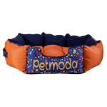 Pet bed with colorful design and 'petmoda' branding on a white background