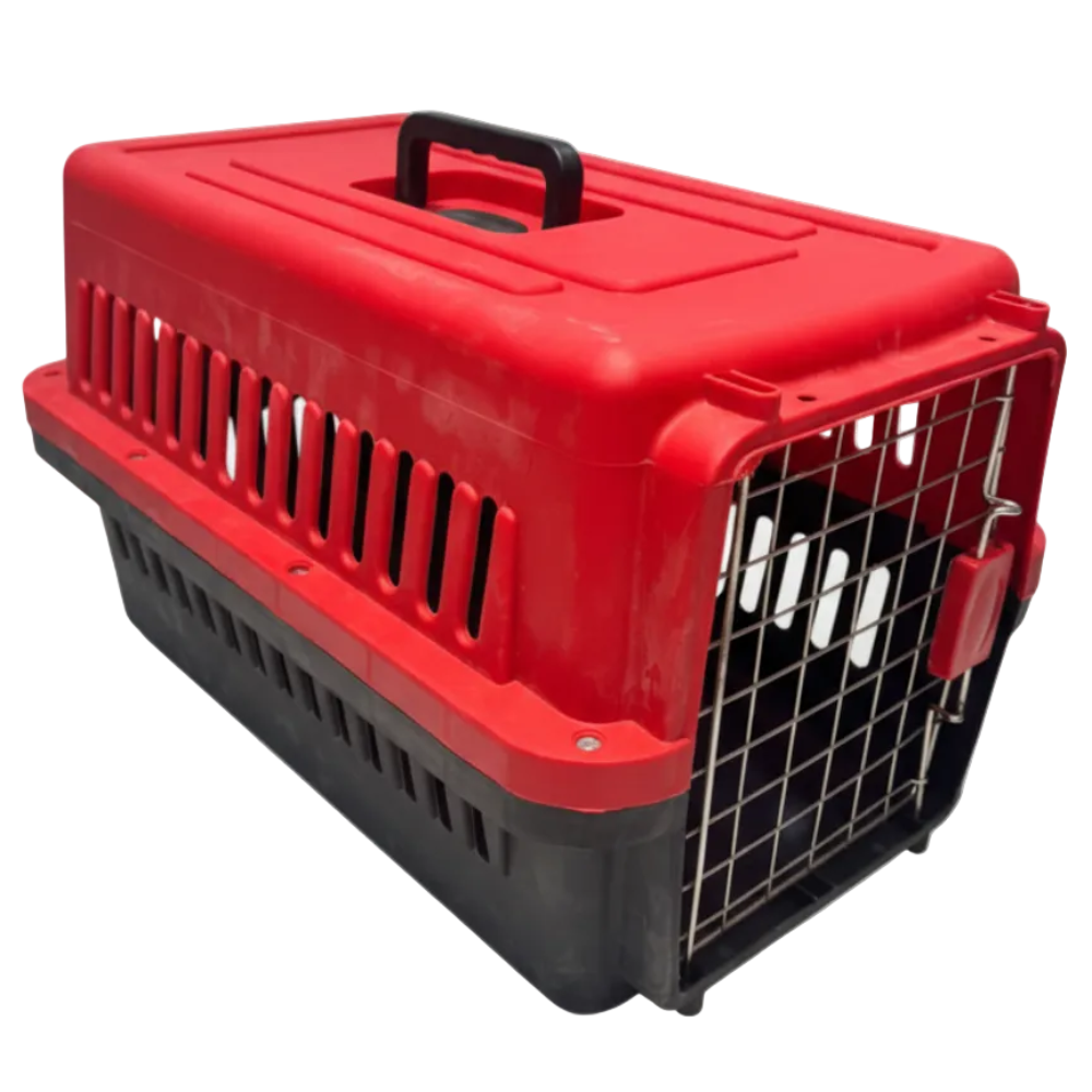 Red and black pet carrier with a handle on a white background