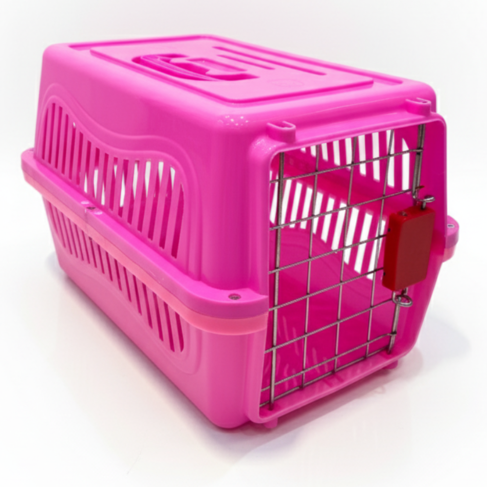 Pink pet carrier with a white background