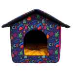 Colorful patterned pet house with a yellow interior on a white background