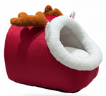 Red pet bed with white lining and brown accents on a white background