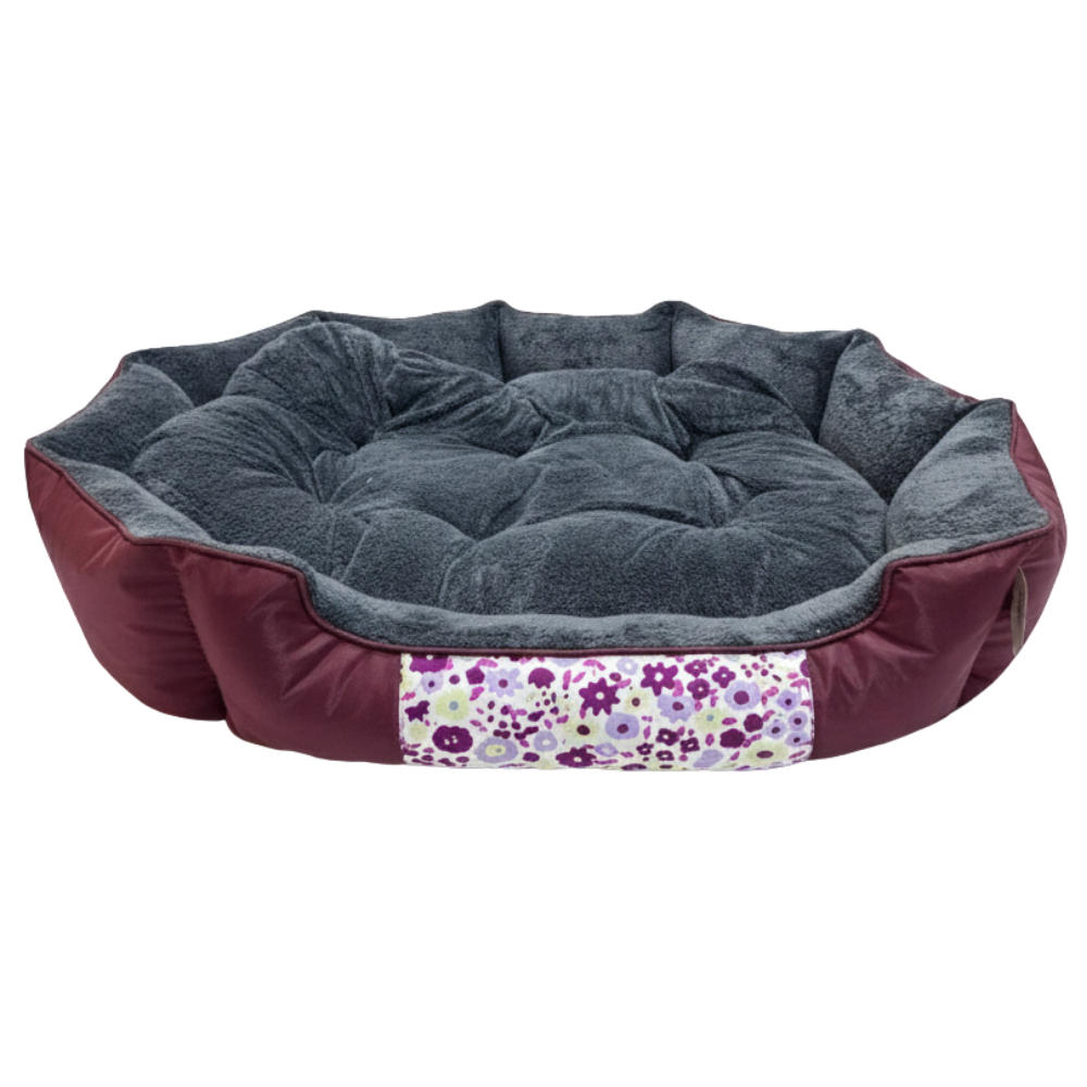 Round pet bed with floral patterned strip on a white background