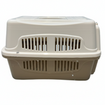 Beige pet carrier with ventilation holes on a white background